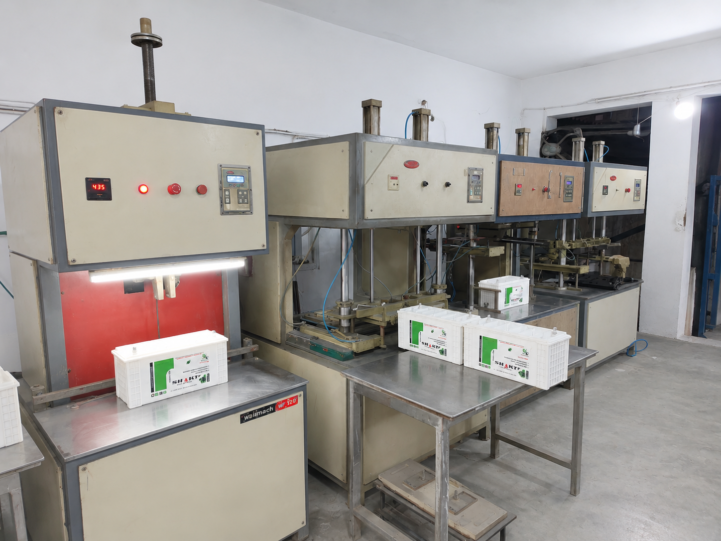 SHARP Manufacturing Facility – grid and plate production line, industrial machinery in operation