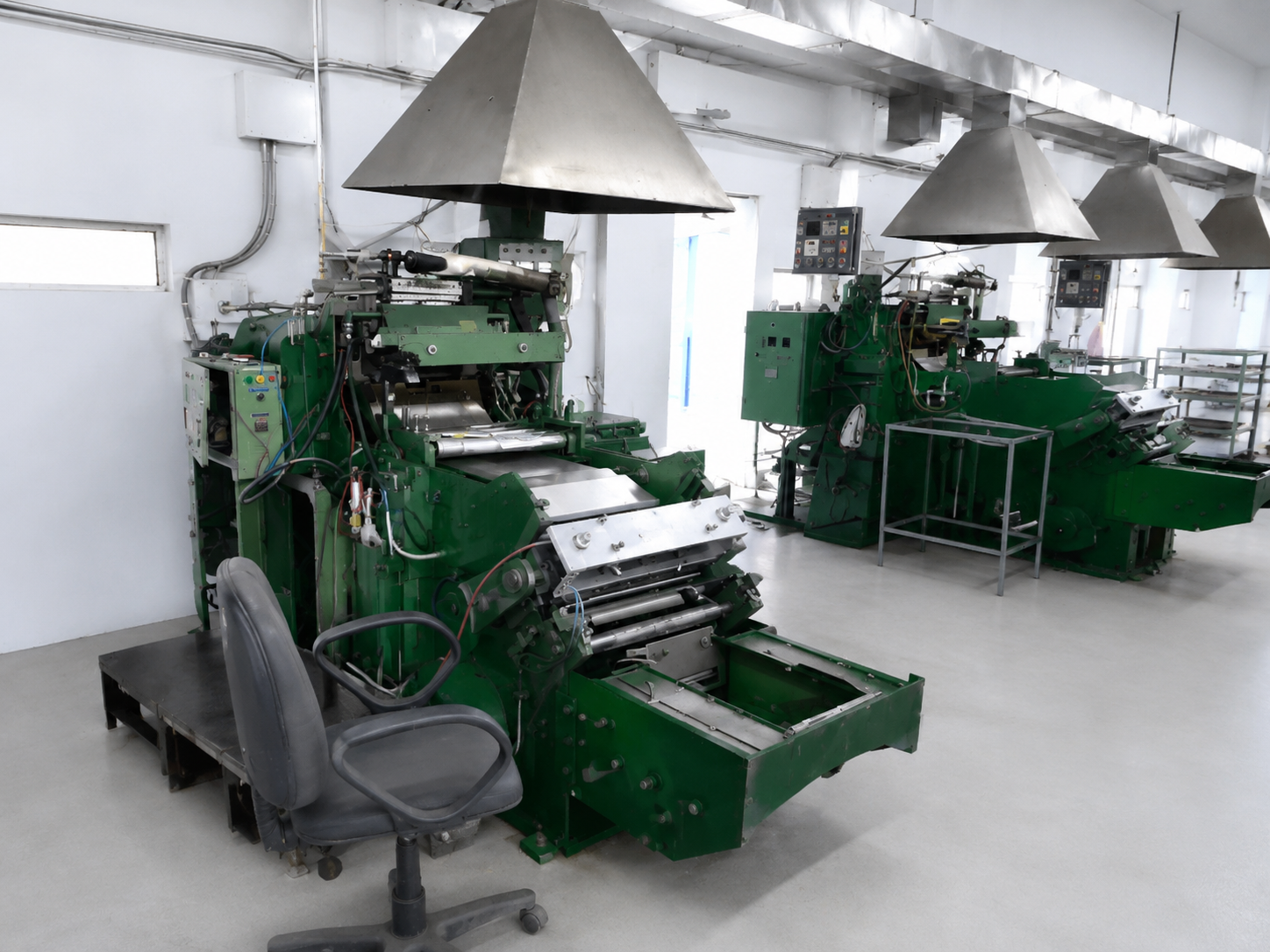 SHARP Manufacturing Facility – quality testing area, technicians conducting battery performance tests